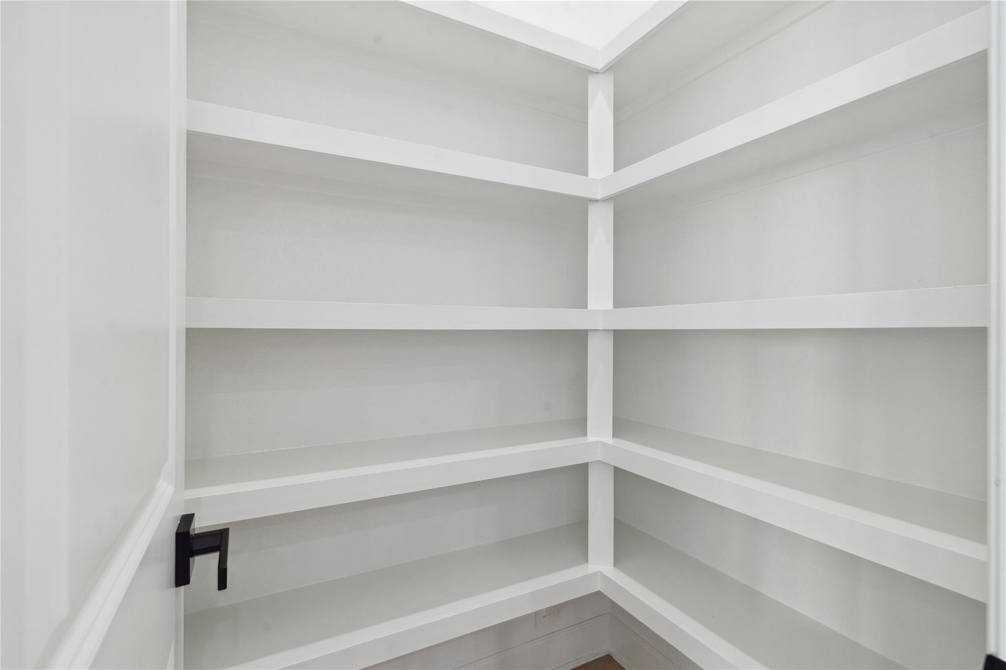 6528 Weston Street, Unit A Houston, TX 77021 - Photo 11 of 25 a view of walk in closet with empty racks