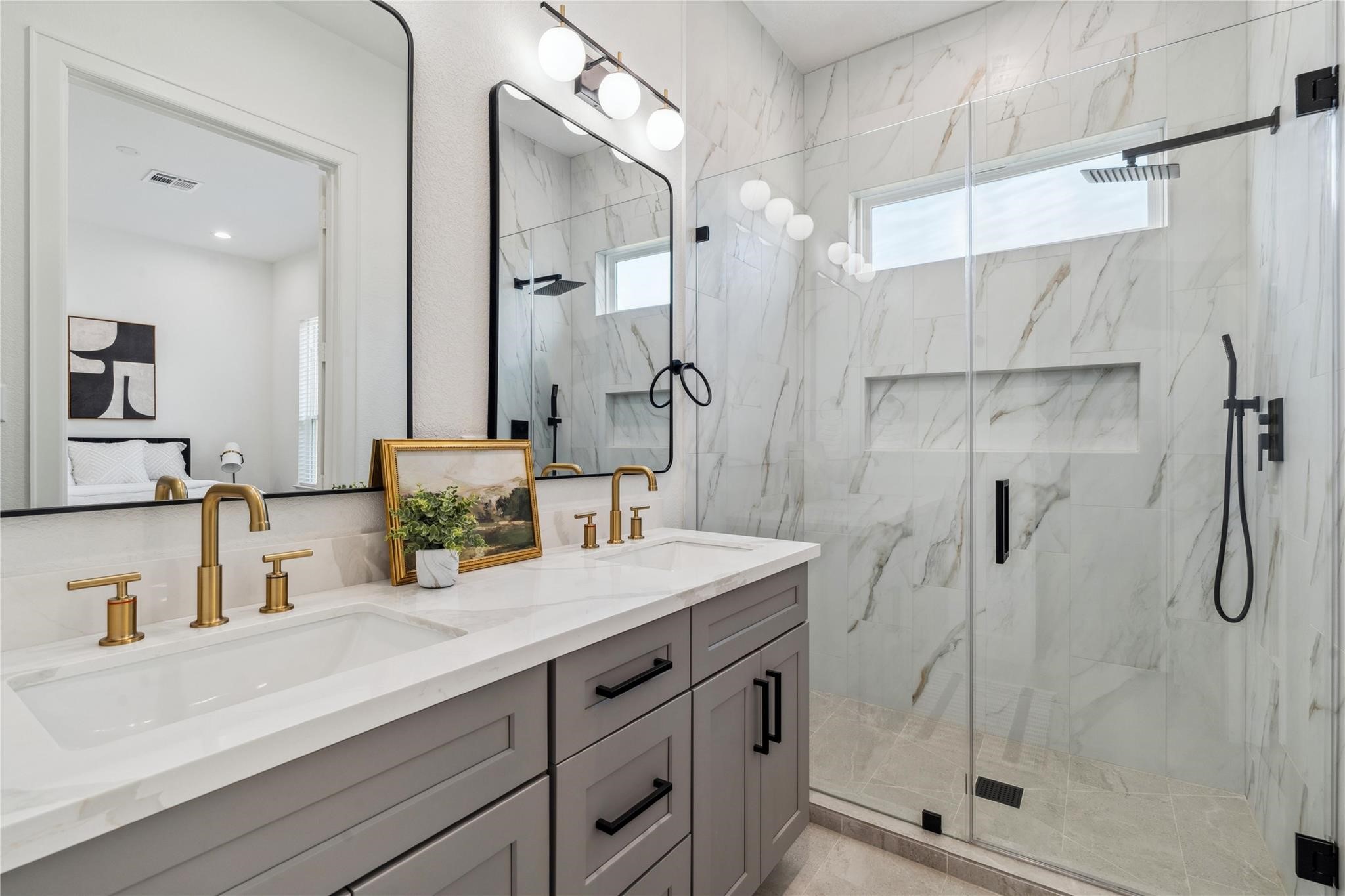 6528 Weston Street, Unit A Houston, TX 77021 - Photo 17 of 25 a bathroom with a granite countertop sink mirror and shower