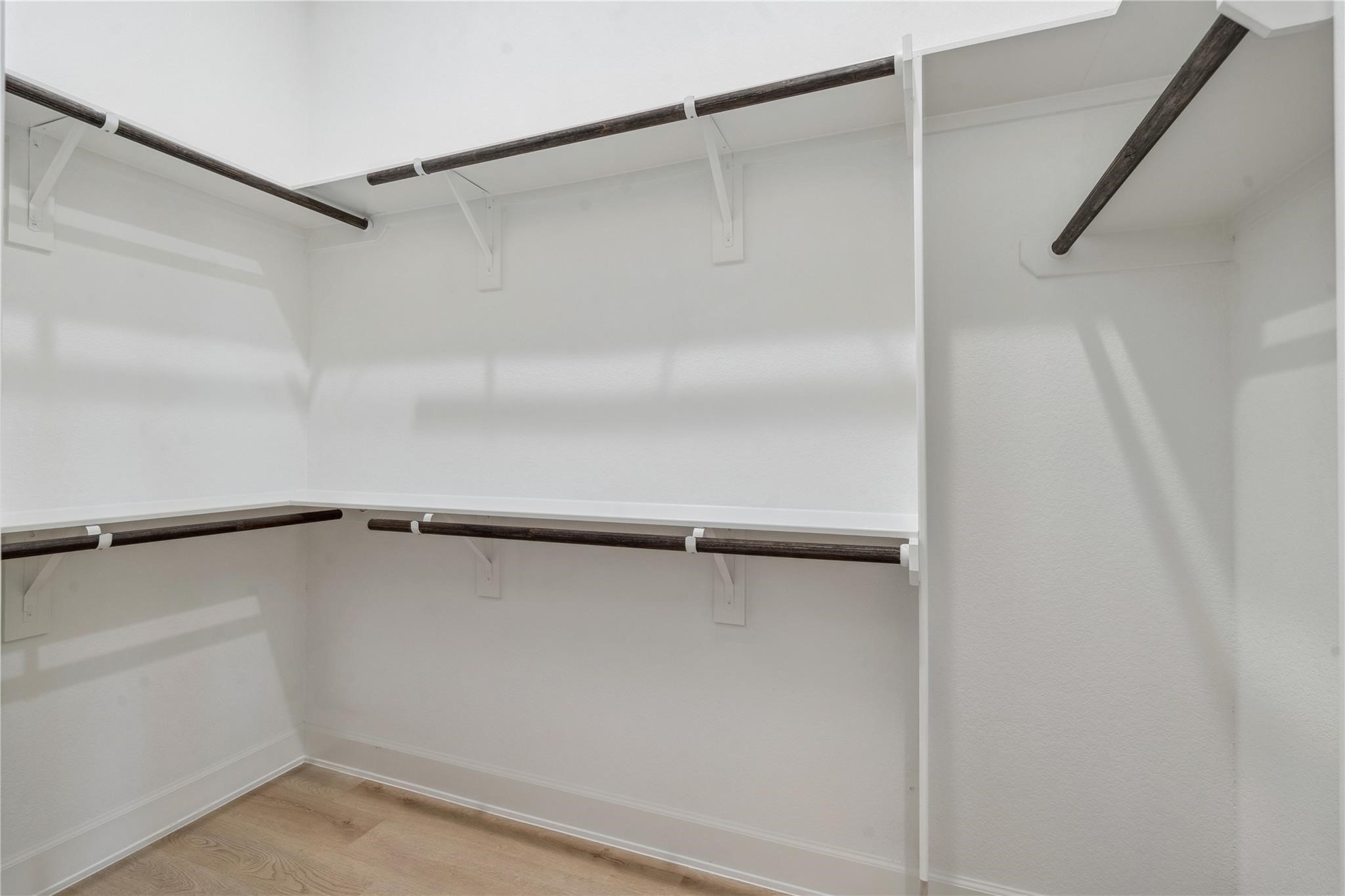 6528 Weston Street, Unit A Houston, TX 77021 - Photo 19 of 25 a view of walk in closet with empty racks