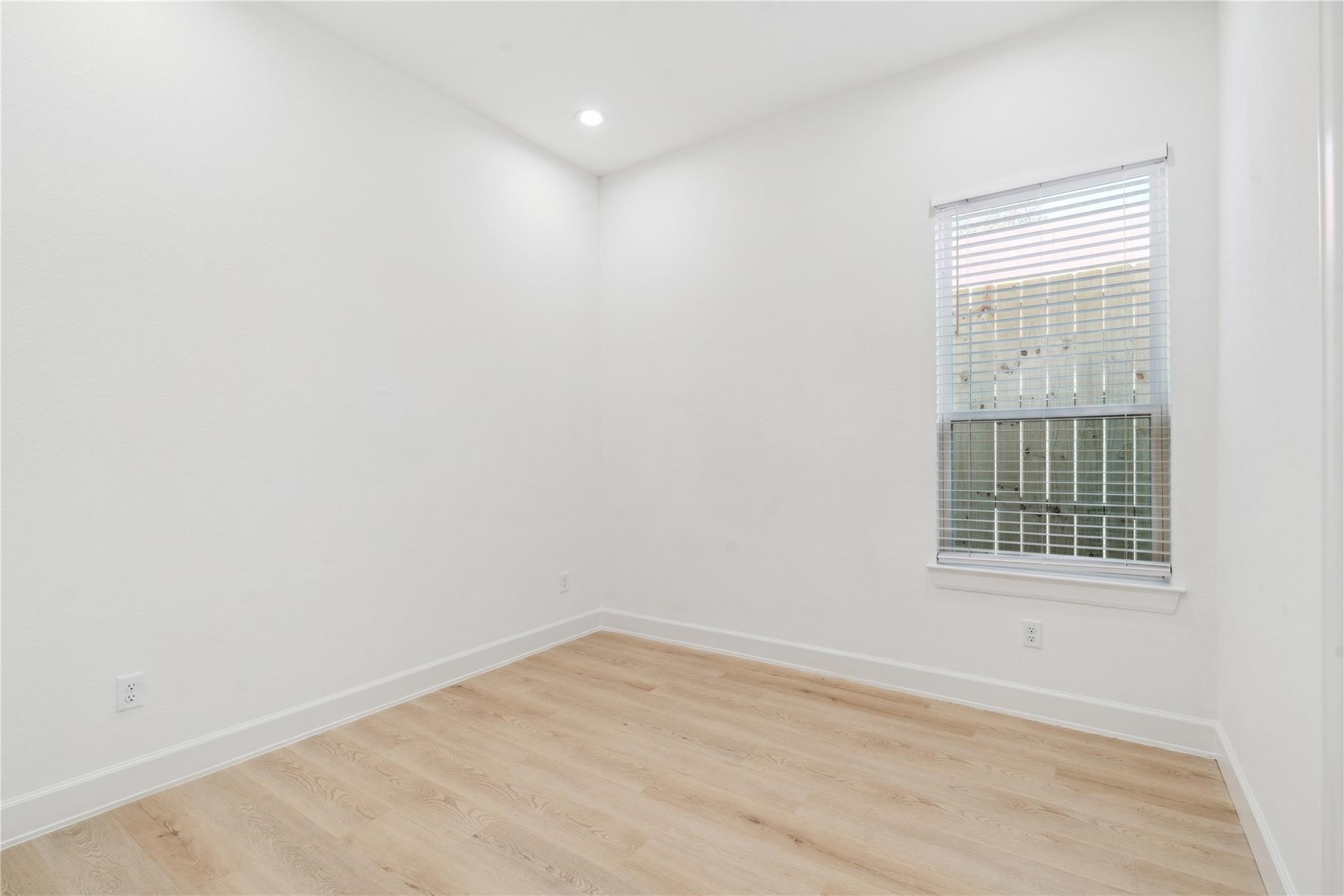 6528 Weston Street, Unit A Houston, TX 77021 - Photo 22 of 25 an empty room with a window