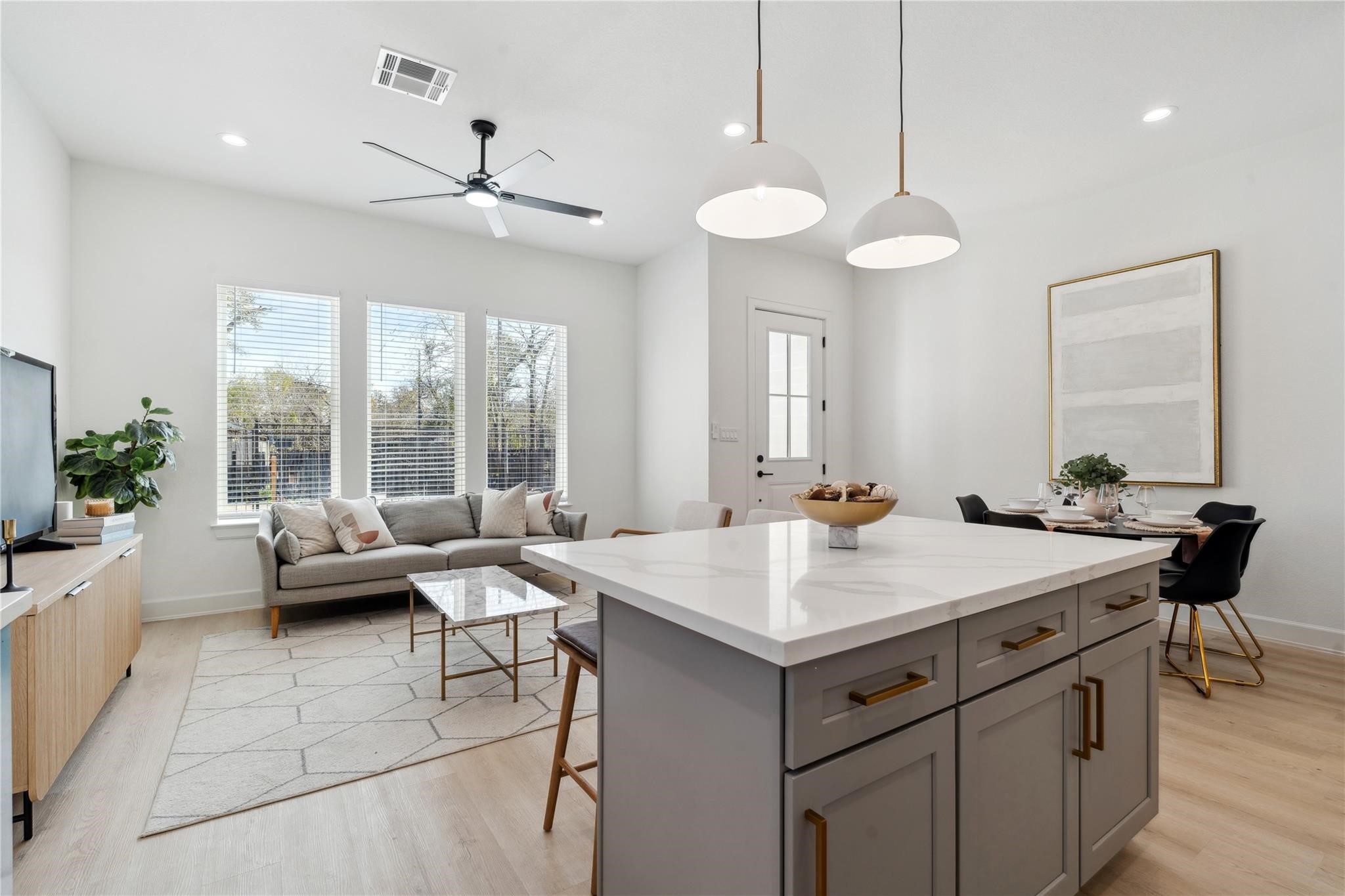 6528 Weston Street, Unit A Houston, TX 77021 - Photo 9 of 25 a room with a table chairs and couches