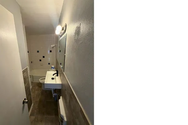a view of a hallway with workspace