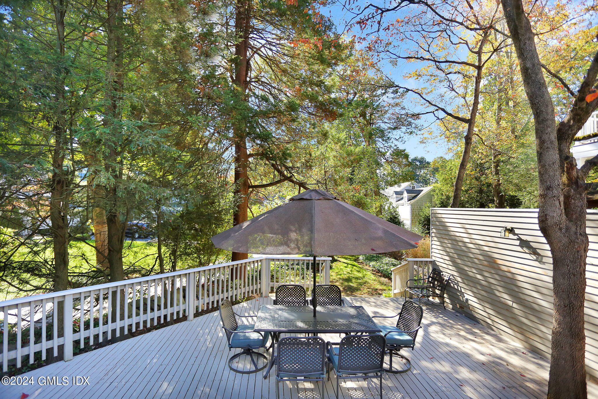 44 Hendrie Avenue Riverside, CT 06878 - Photo 25 of 40 a view of a chairs and table on the wooden floor