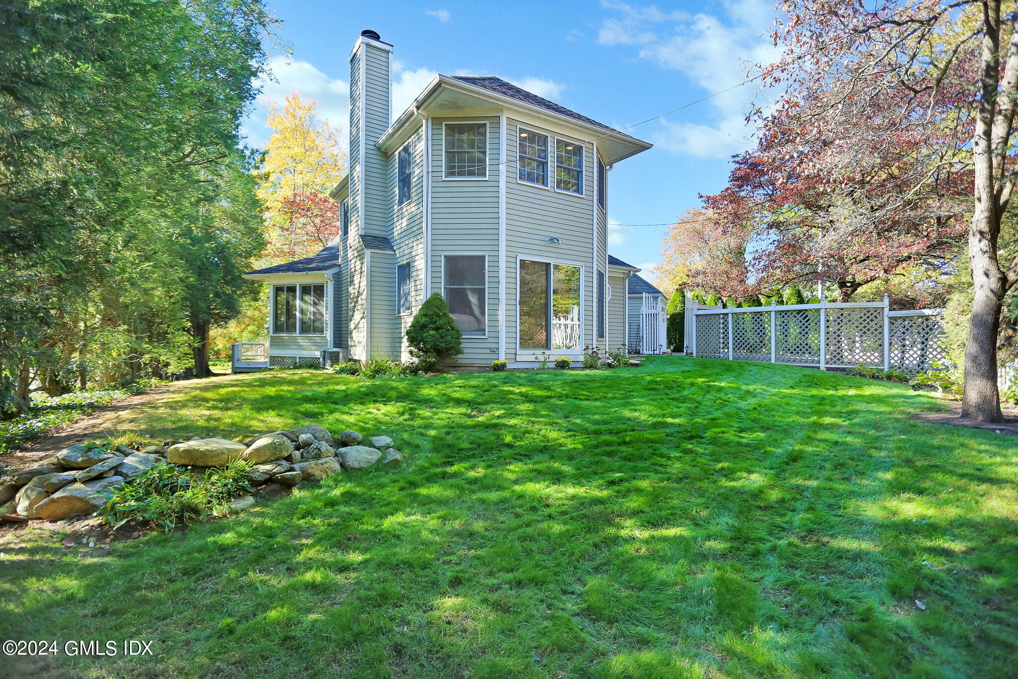 44 Hendrie Avenue Riverside, CT 06878 - Photo 31 of 40 a front view of a house with a yard