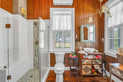 a view of a door and chair in the patio