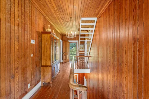 a view of entryway with wooden floor