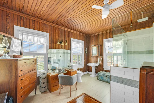 a very nice looking living room with a large window