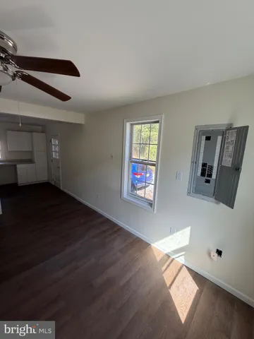 a view of an empty room and window