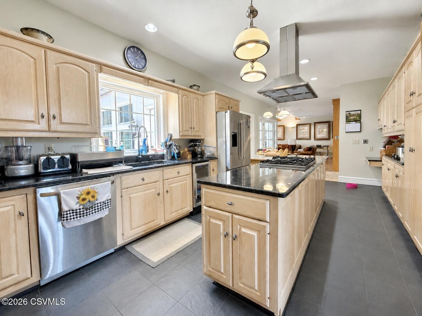 50 Sweet Gum Road Selinsgrove, PA 17870 - Photo 31 of 82 a kitchen with stainless steel appliances granite countertop a sink a stove cabinets and a window