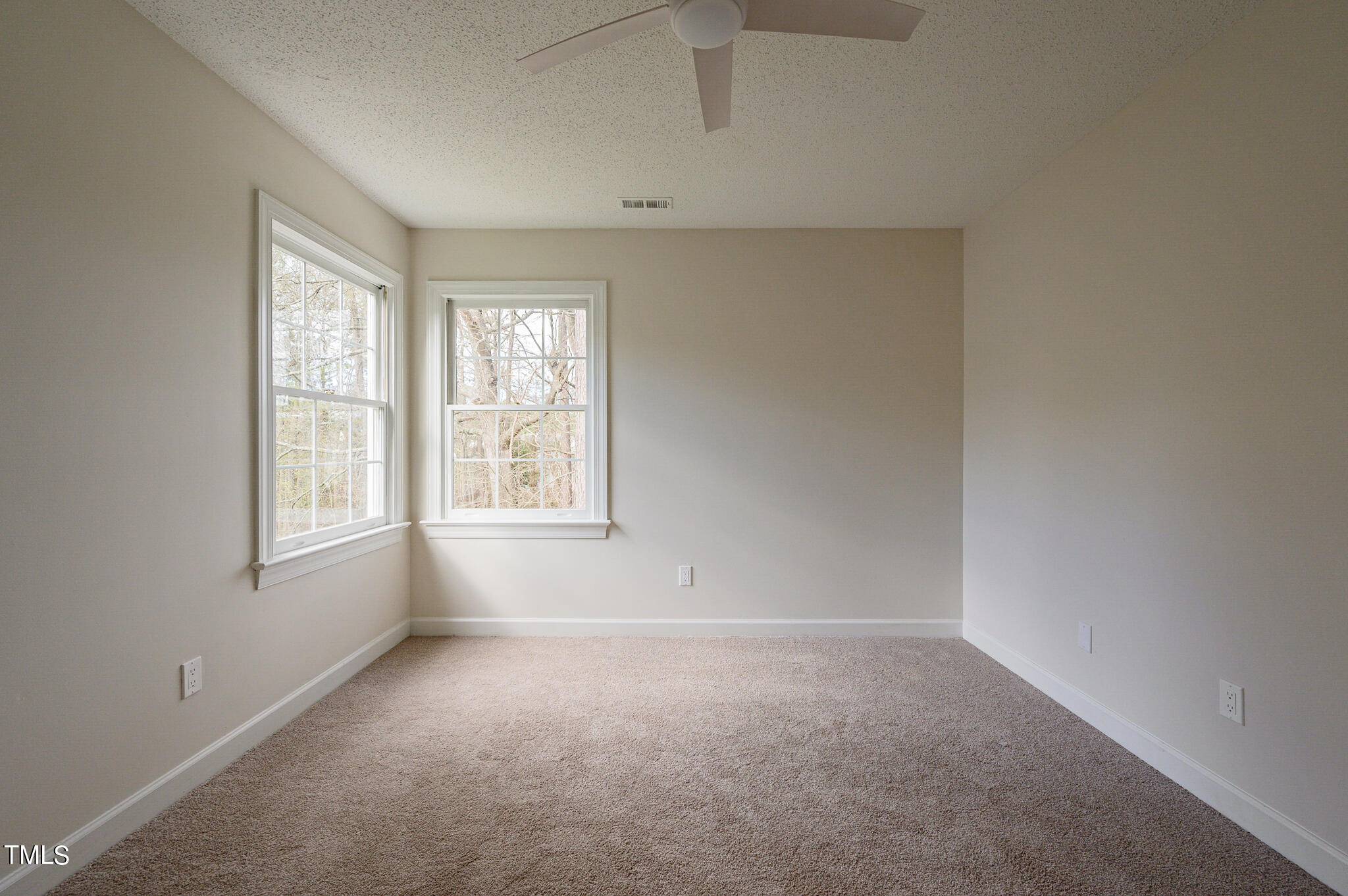 5620 Raddington Street Raleigh, NC 27613 - Photo 26 of 41 a view of an empty room with a window