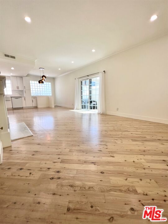 1128 17th Street, Unit E Santa Monica, CA 90403 - Photo 2 of 25 a view of an empty room