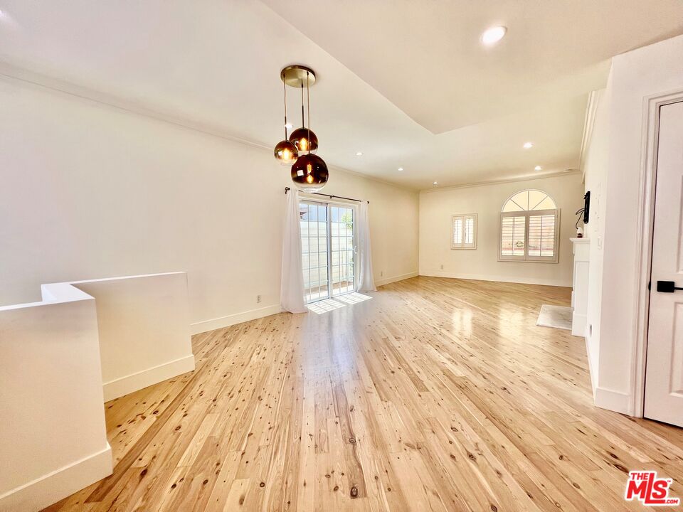 1128 17th Street, Unit E Santa Monica, CA 90403 - Photo 3 of 25 a view of an empty room and window