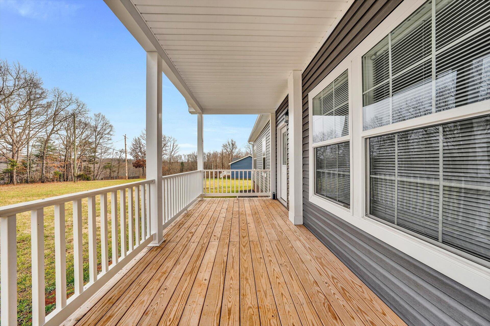 4993 Horseshoe Bend Road Goodview, VA 24095 - Photo 4 of 30 a view of a balcony with wooden floor