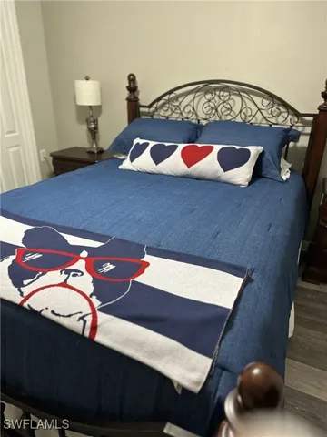 a view of an chairs and table in a room