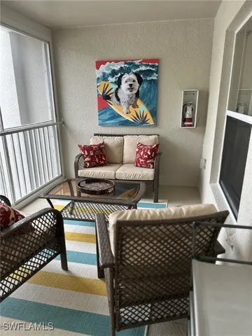 a view of a chair in a balcony