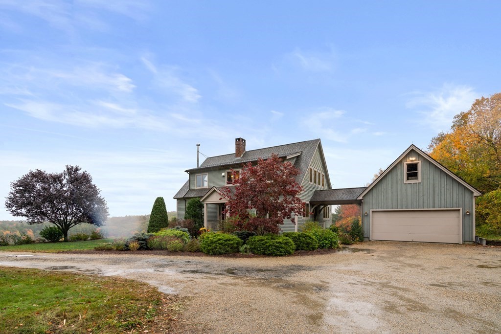 66 Fiskdale Road Brookfield, MA 01506 - Photo 2 of 32 front view of house with a yard