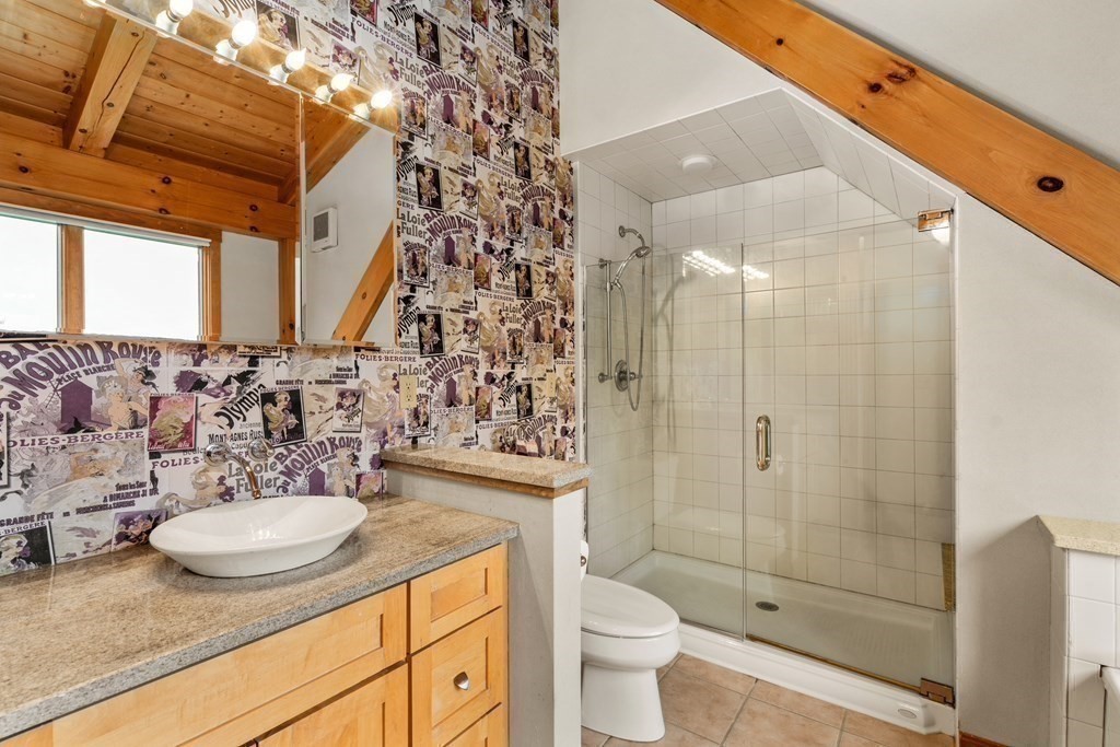 66 Fiskdale Road Brookfield, MA 01506 - Photo 26 of 32 a bathroom with a sink a toilet and shower