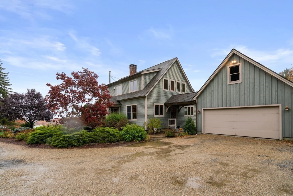 66 Fiskdale Road Brookfield, MA 01506 - Photo 3 of 32 front view of house with a yard