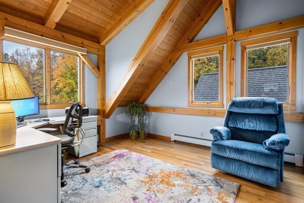 66 Fiskdale Road Brookfield, MA 01506 - Photo 31 of 32 a living room with furniture and a window