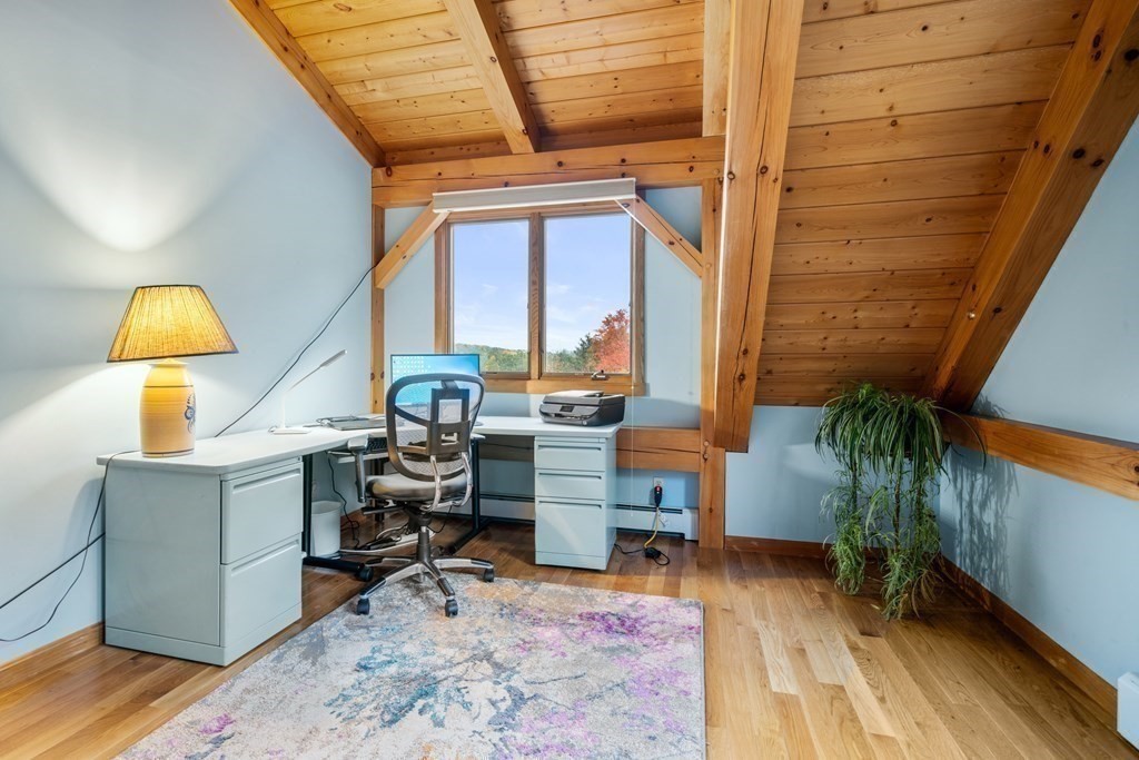 66 Fiskdale Road Brookfield, MA 01506 - Photo 32 of 32 a view of a workspace with furniture and a window