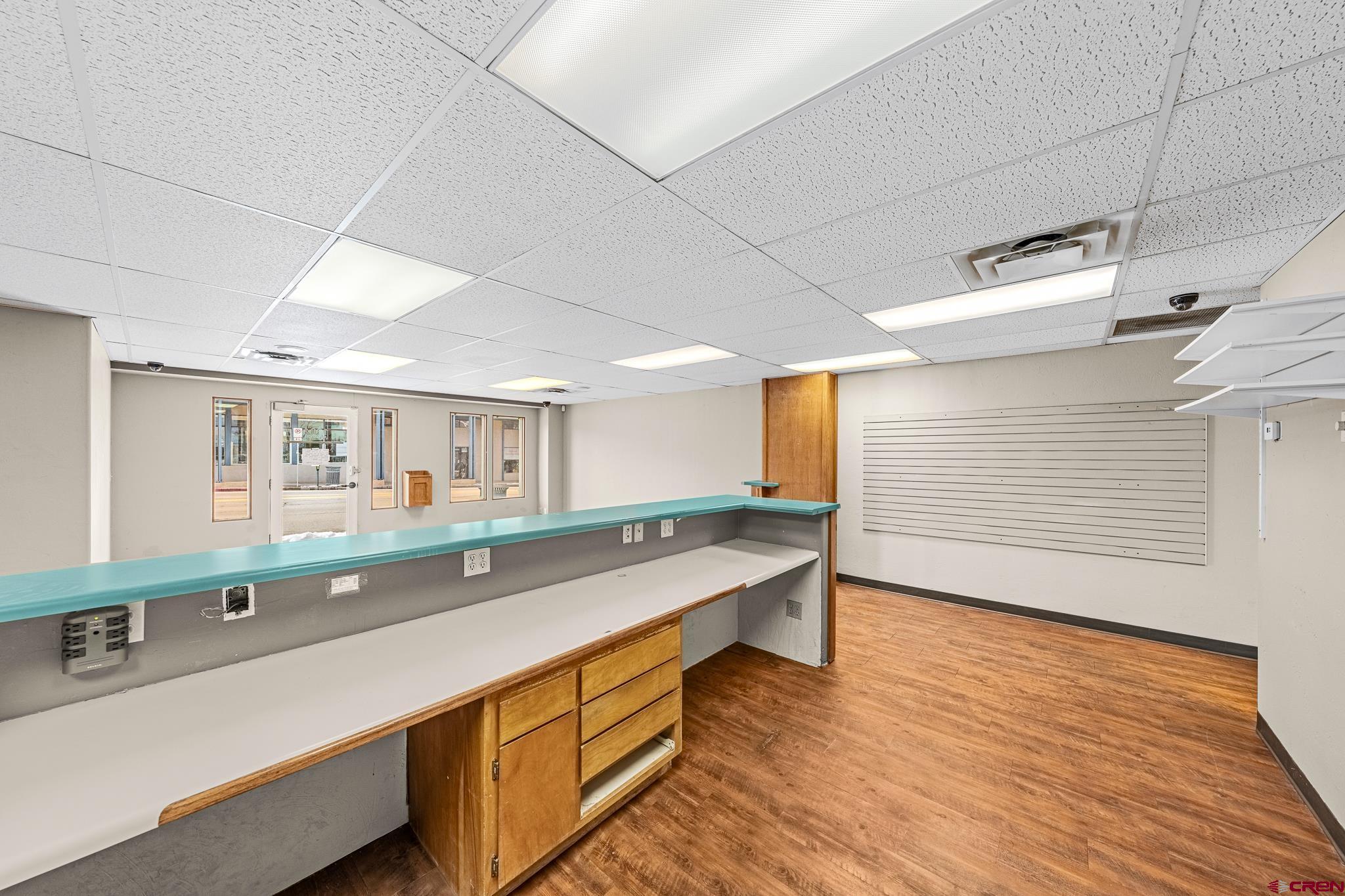 1304 Main Avenue Durango, CO 81301 - Photo 11 of 35 a kitchen with stainless steel appliances granite countertop a sink and wooden cabinets
