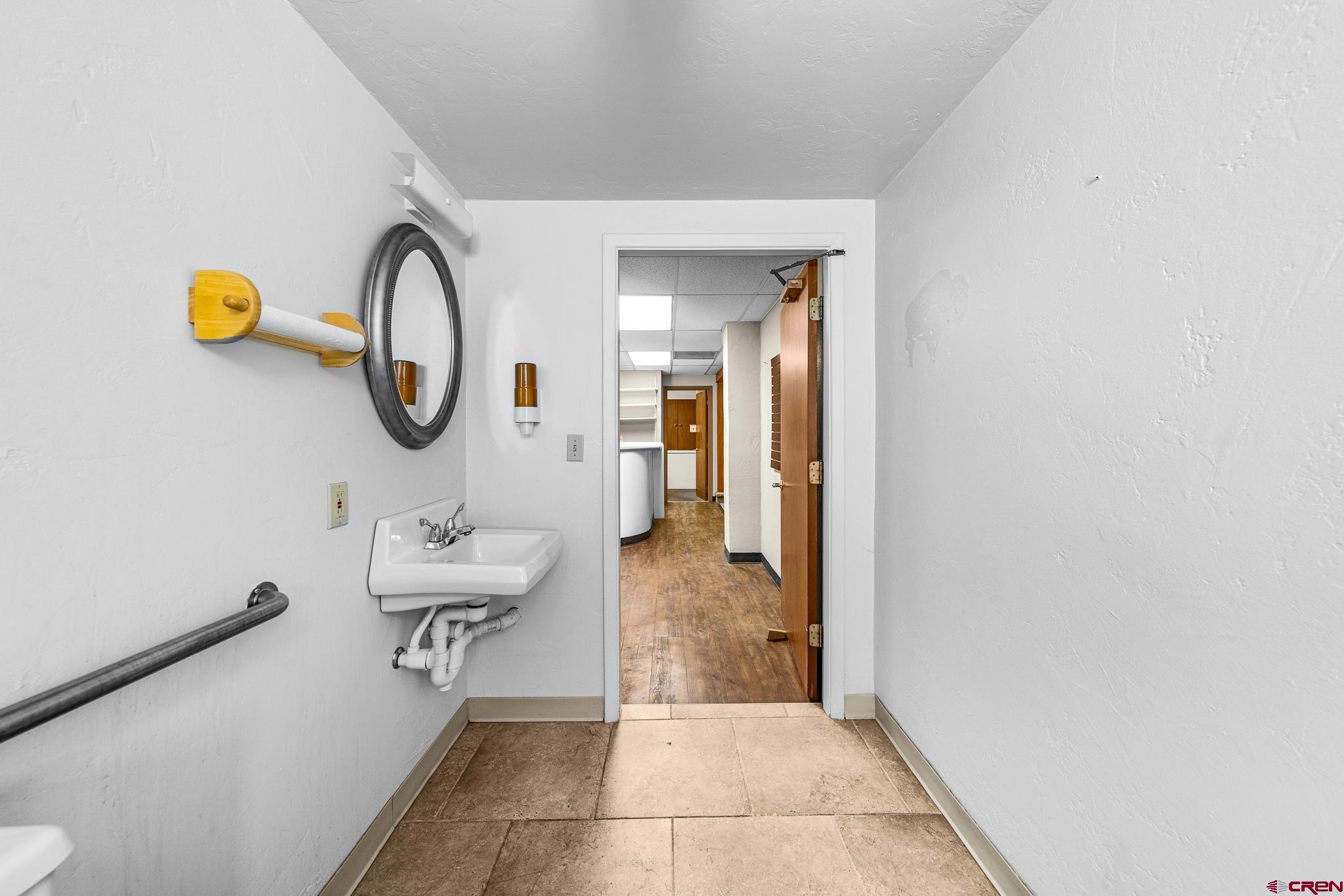 1304 Main Avenue Durango, CO 81301 - Photo 20 of 35 a view of a room that has a bed and a chair in it