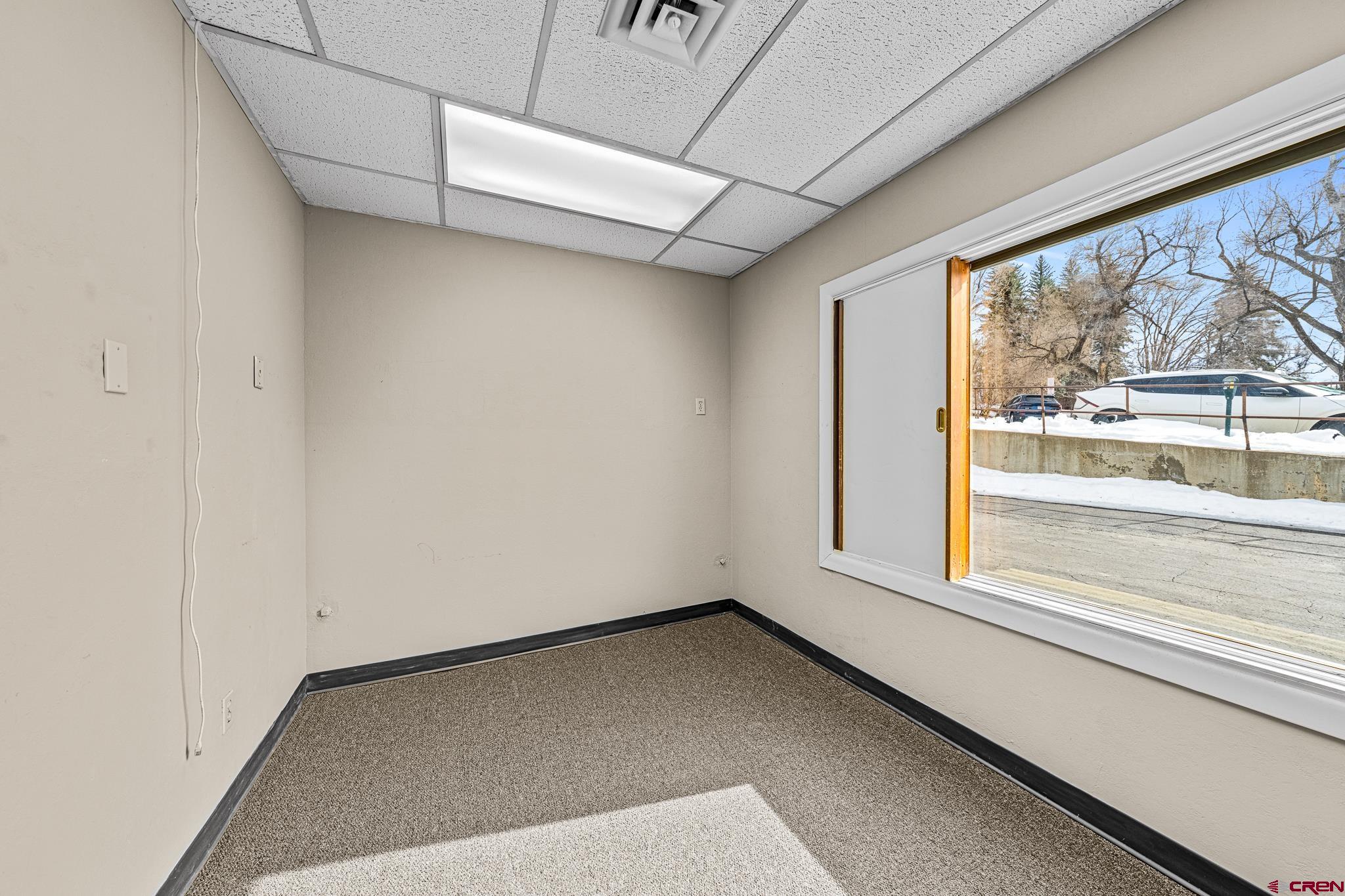 1304 Main Avenue Durango, CO 81301 - Photo 27 of 35 a view of an empty room with a window