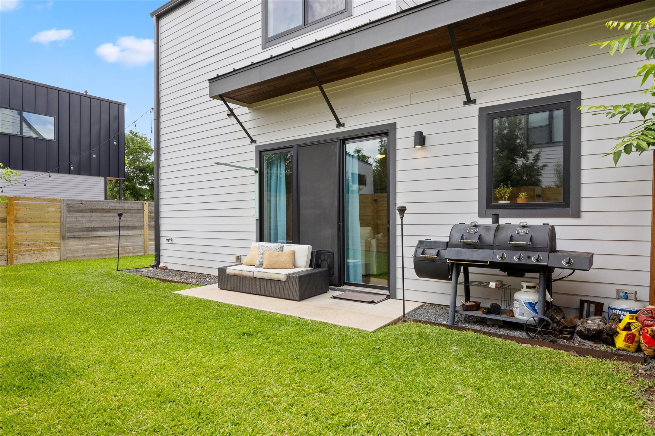 1116 Stobaugh Street, Unit B Austin, TX 78757 - Photo 31 of 38 The backyard offers flexibility for relaxing, gardening, or outdoor dining.