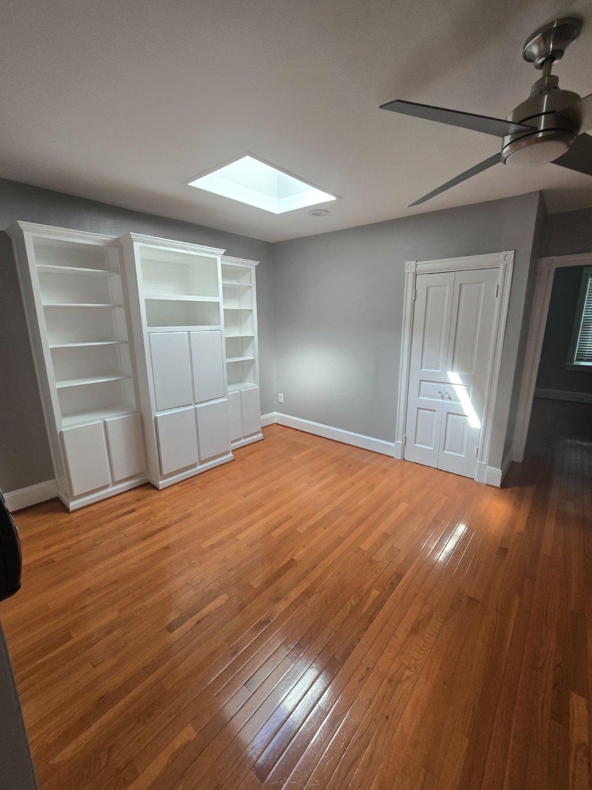 540 14th Street Southeast Washington, DC 20003 - Photo 9 of 11 an empty room with wooden floor and windows