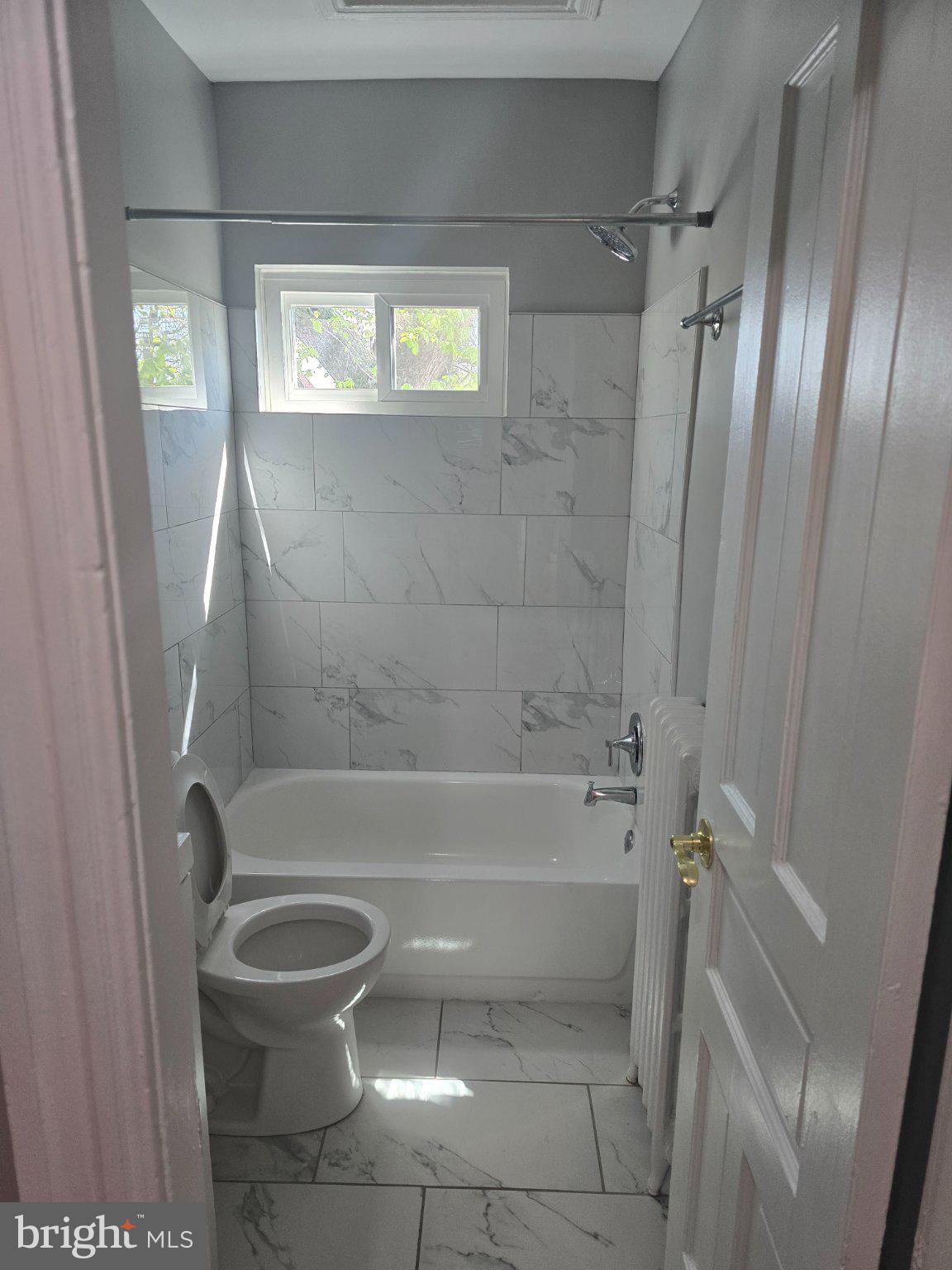 540 14th Street Southeast Washington, DC 20003 - Photo 10 of 11 a bathroom with a toilet and a shower