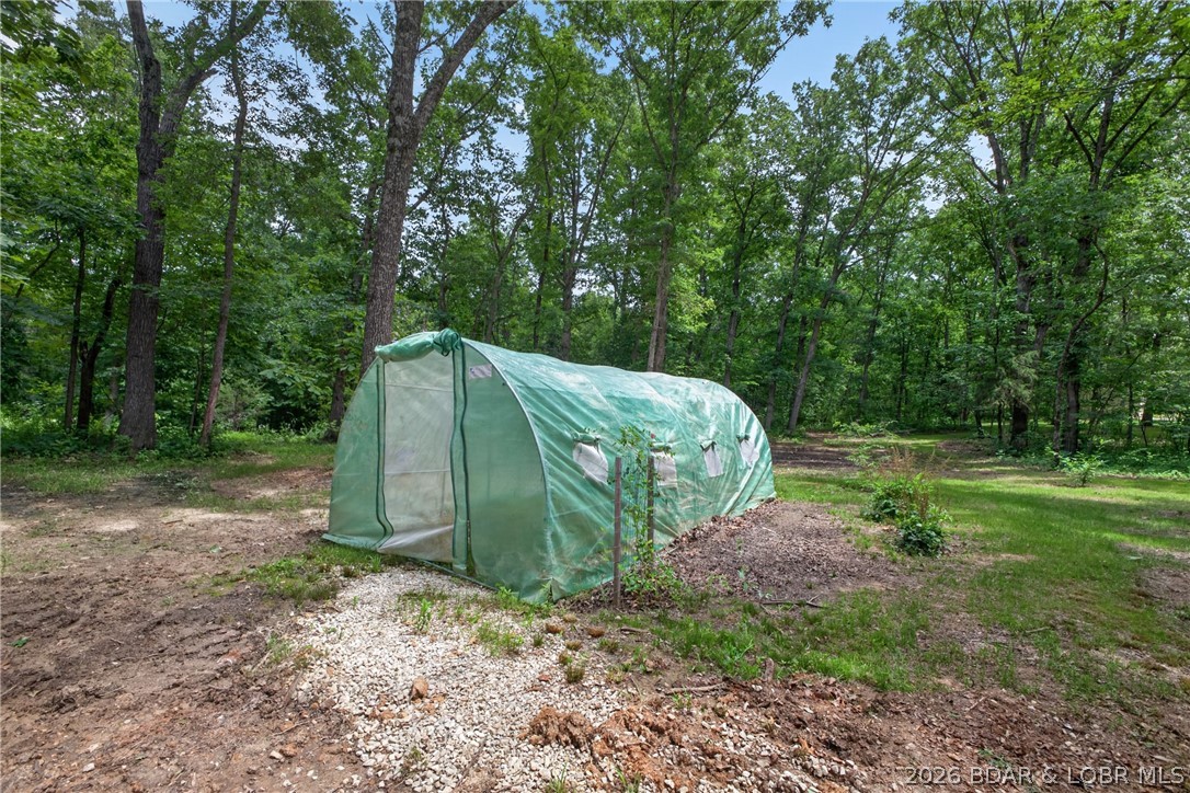 25145 State Route West Barnett, MO 65011 - Photo 38 of 58 Greenhouse, garden, homestead!