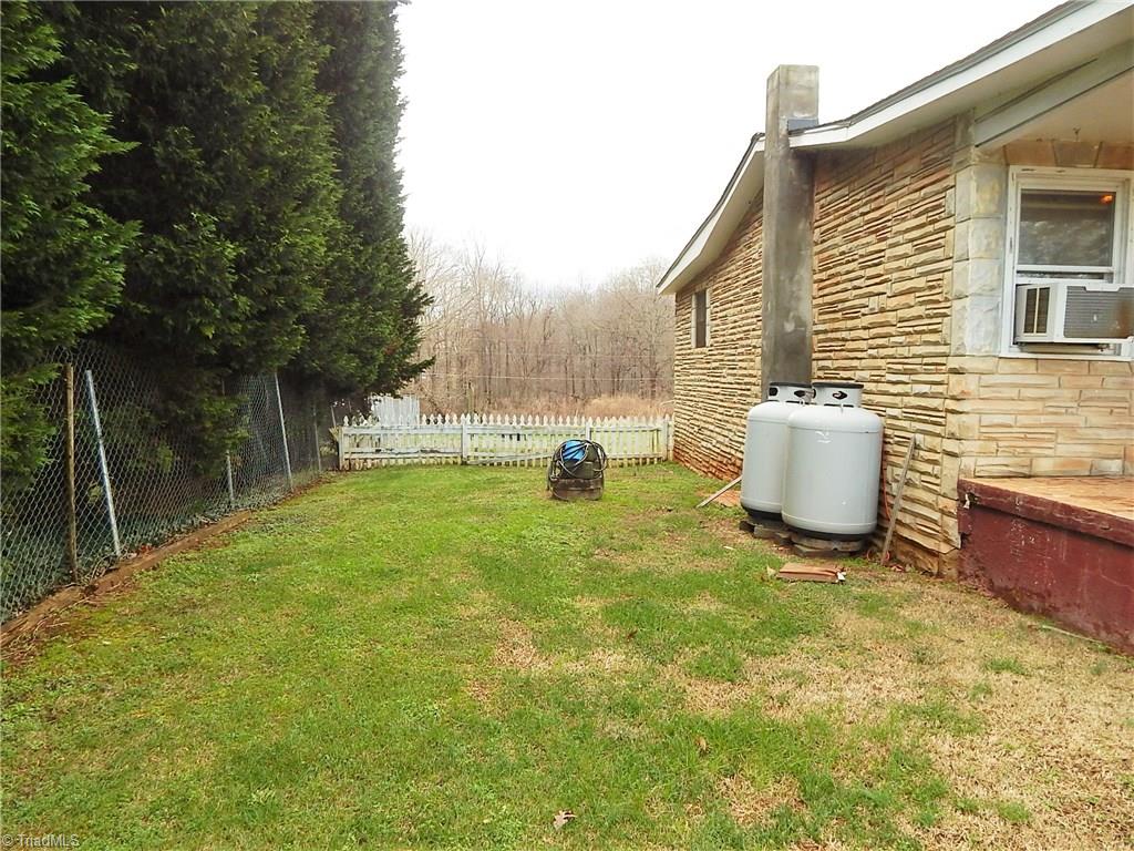 8607 Hudson James Road Summerfield, NC 27358 - Photo 28 of 30 Side yard