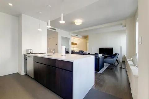 a living room with sink and furniture