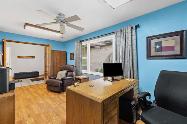 a view of a workspace with furniture