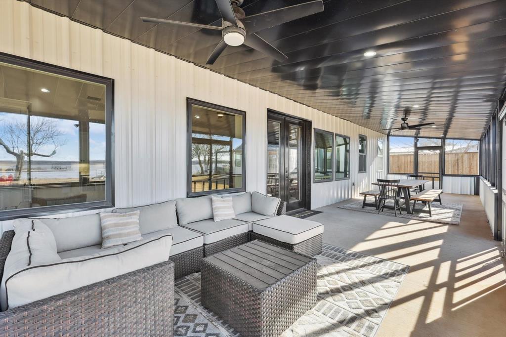 413 Hoot Avenue Graford, TX 76449 - Photo 20 of 38 a living room with furniture and a large window