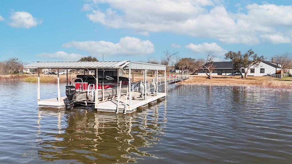 413 Hoot Avenue Graford, TX 76449 - Photo 3 of 38 a view of swimming pool with an outdoor seating