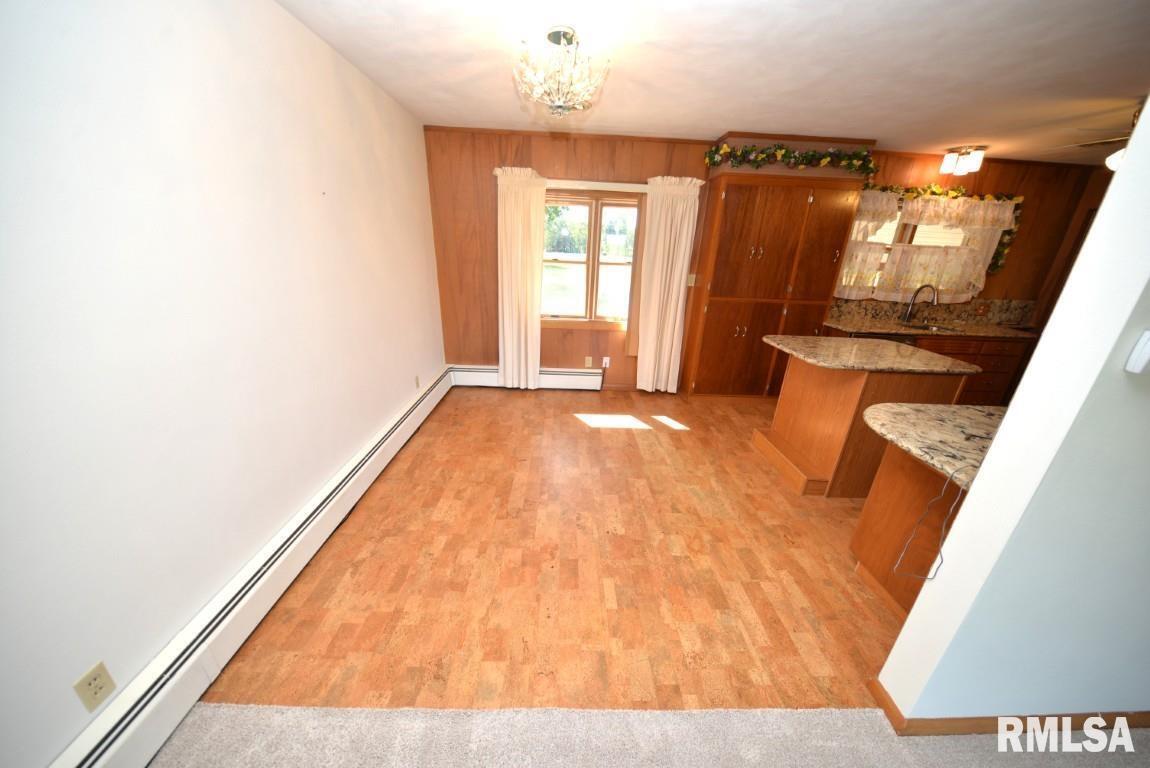11455 East Richview Road Mount Vernon, IL 62864 - Photo 16 of 37 a view of a room with wooden floor and windows