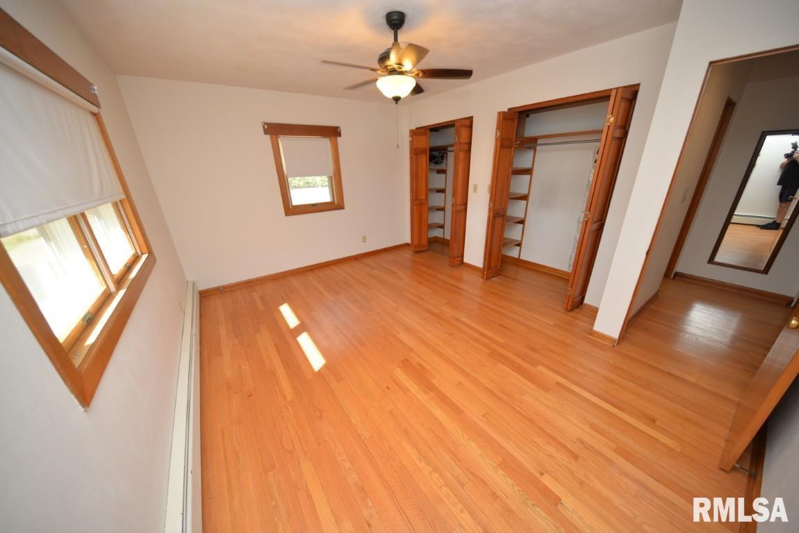 11455 East Richview Road Mount Vernon, IL 62864 - Photo 28 of 37 wooden floor in an empty room with a window