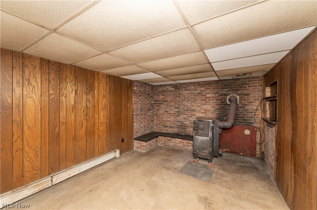 12310 Huntoon Road Painesville, OH 44077 - Photo 32 of 48 Family room with wood burning stove