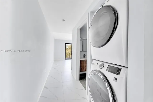 a utility room with dryer and washer