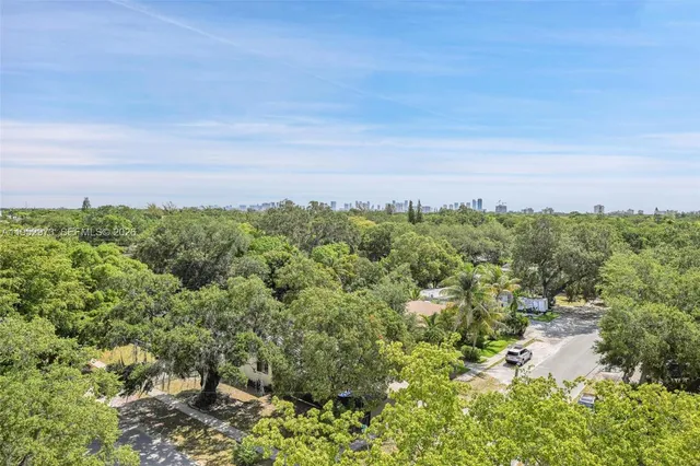 a view of a field with lots of bushes