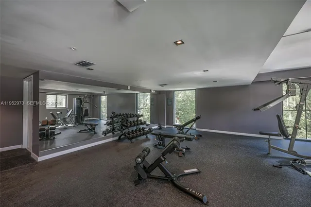 a view of a swimming pool with a lounge chair