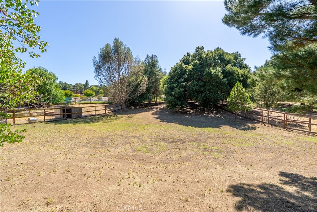 3388 Ramona Road Atascadero, CA 93422 - Photo 42 of 55 At the back part of the ~1.17 acre property is a wide open space. Walk to school with ease through the gate located in the back corner of the property.