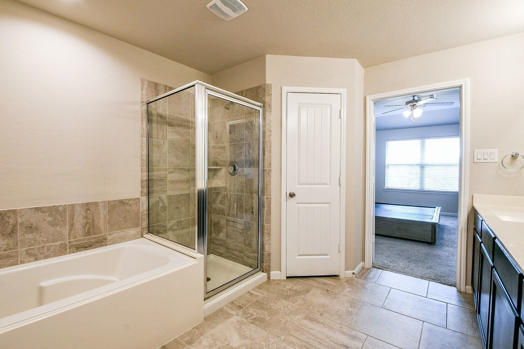 1515 Anyder Place Houston, TX 77047 - Photo 14 of 21 a bathroom with a tub shower and sink