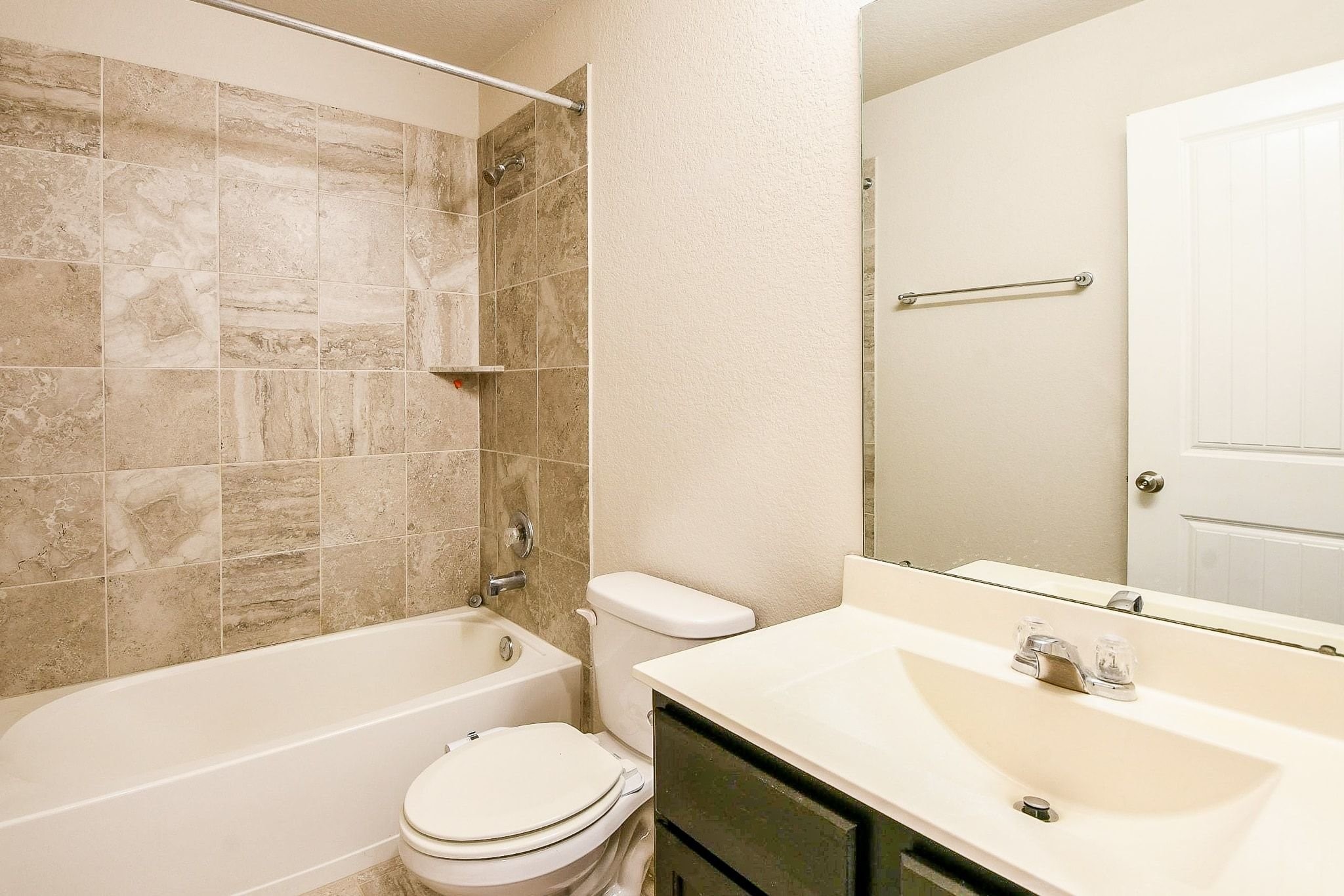 1515 Anyder Place Houston, TX 77047 - Photo 17 of 21 a bathroom with a sink toilet and shower