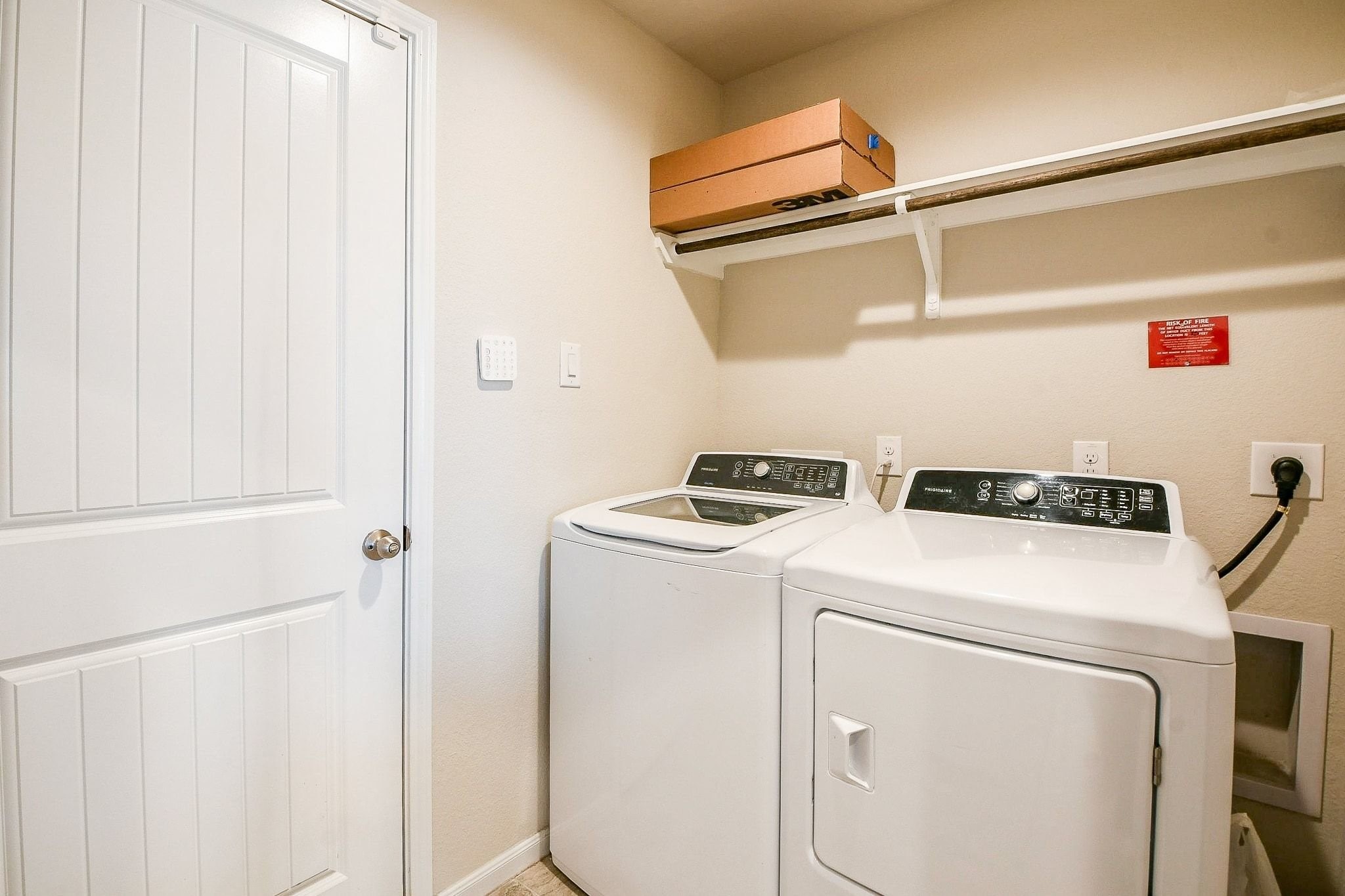 1515 Anyder Place Houston, TX 77047 - Photo 19 of 21 a utility room with dryer and washer