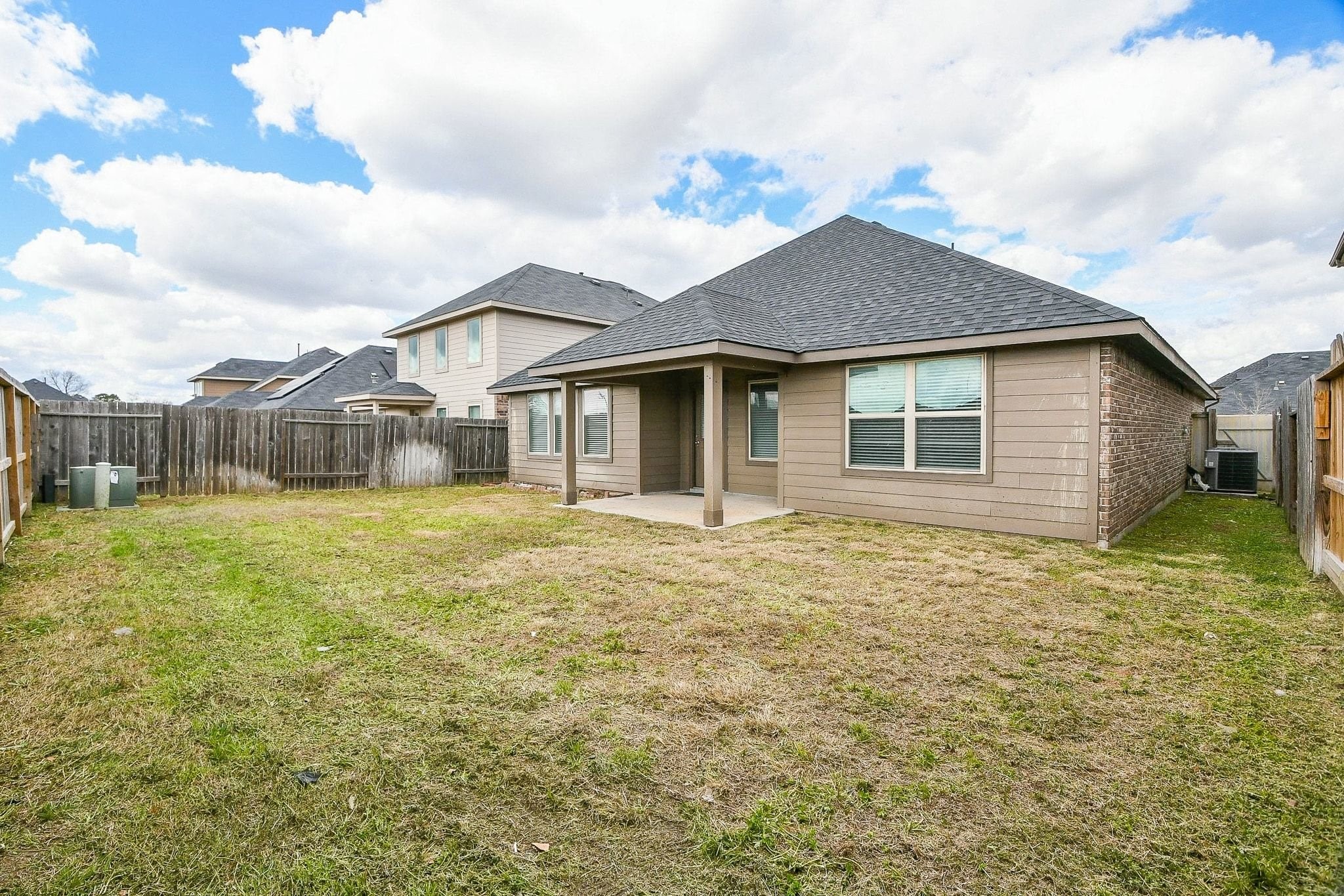 1515 Anyder Place Houston, TX 77047 - Photo 21 of 21 a front view of a house with a garden