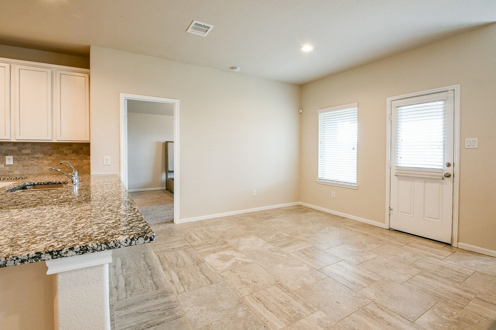 1515 Anyder Place Houston, TX 77047 - Photo 9 of 21 a view of a kitchen with granite countertop cabinets and sink