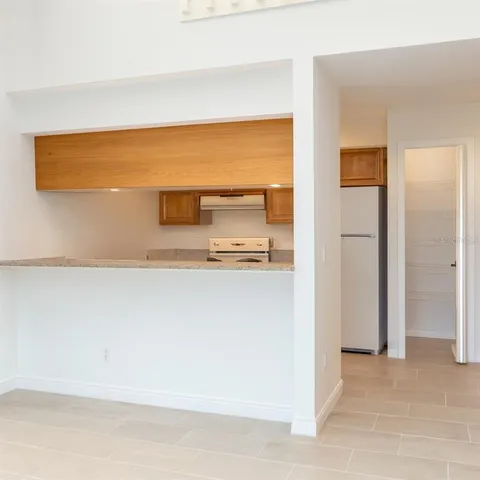 a view of a living room with a large window