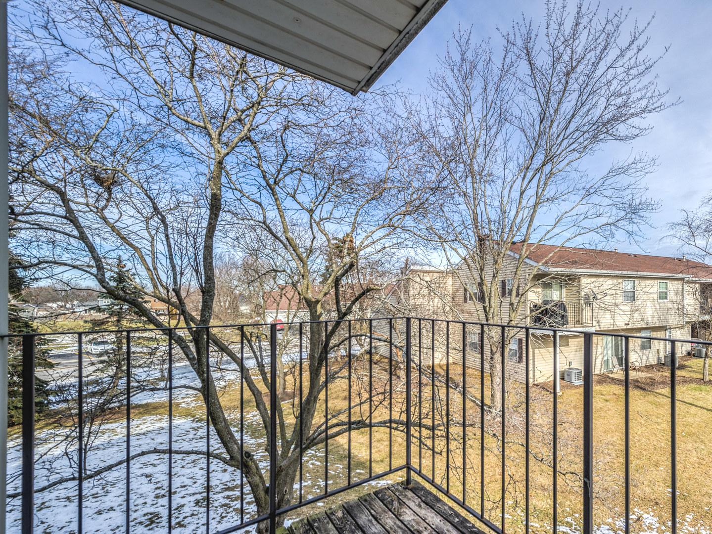 15 Gant Circle, Unit E Streamwood, IL 60107 - Photo 14 of 18 a view of a backyard